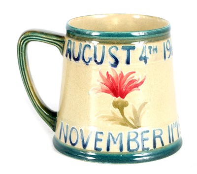 Lot 110 - A MOORCROFT BURSLEM TAPERING 1919 PEACE MUG...
