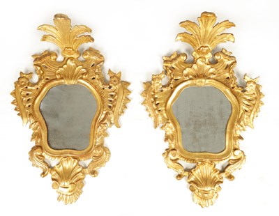 Lot 1109 - A PAIR OF 19TH CENTURY CARVED GILT WOOD...