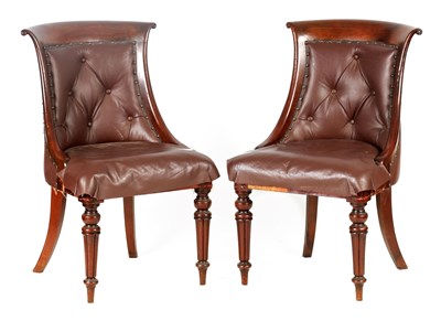 Lot 1117 - A PAIR OF LATE REGENCY LEATHER BUTTON BACKED...