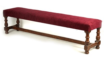 Lot 1151 - A 19TH CENTURY WALNUT WINDOW SEAT with...