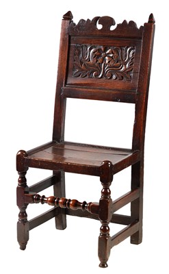 Lot 1154 - A 17TH CENTURY OAK SIDE CHAIR with raised...