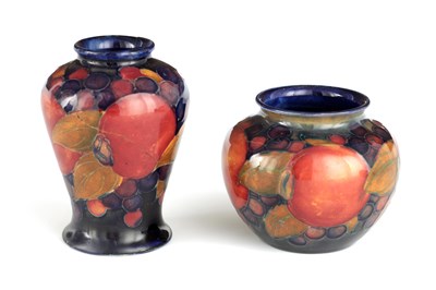 Lot 116 - A 1920S MOORCROFT MINIATURE SQUAT BULBOUS VASE...