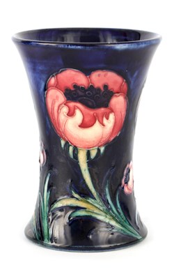 Lot 117 - A 1920S MOORCROFT FLARED MINIATURE VASE tube...