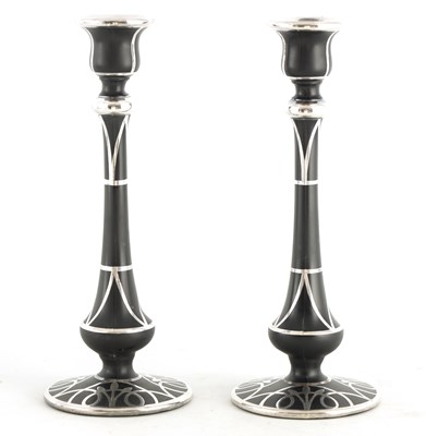 Lot 12 - A PAIR OF 20TH CENTURY BLACK AMETHYST GLASS...