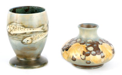 Lot 123 - A 1920S/30S MOORCROFT FOOTED OVOID VASE tube...