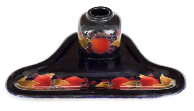 Lot 124 - A MOORCROFT BURSLEM SHAPED COMBINED PEN TRAY...