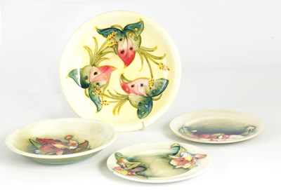 Lot 129 - A MOORCROFT SHALLOW DISH tube lined and...