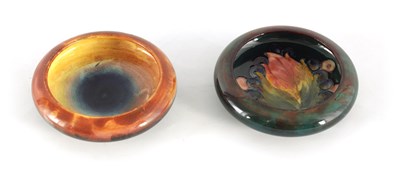 Lot 135 - A MOORCROFT SHALLOW SMALL DISH WITH CURVED RIM...