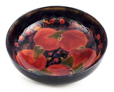 Lot 150 - AN EARLY MOORCROFT BURSLEM SHALLOW FRUIT BOWL...