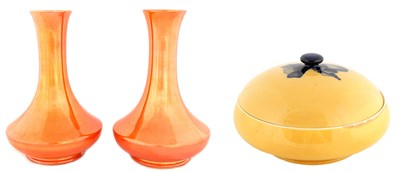 Lot 168 - A PAIR OF 1920S MOORCROFT ORANGE LUSTRE WARE...