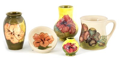 Lot 180 - A MOORCROFT MINIATURE BULBOUS CABINET VASE...