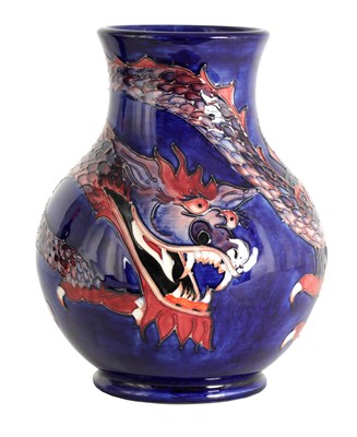 Lot 181 - A WILLIAM MOORCROFT LARGE FOOTED BULBOUS VASE...