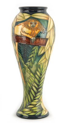 Lot 188 - A MOORCROFT FOOTED SLENDER OVOID VASE DESIGNED...