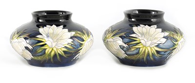 Lot 190 - A PAIR OF WILLIAM MOORCROFT SQUAT BULBOUS...