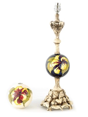Lot 199 - AN ORNATE FLORAL DESIGN RESIN AND CERAMIC...