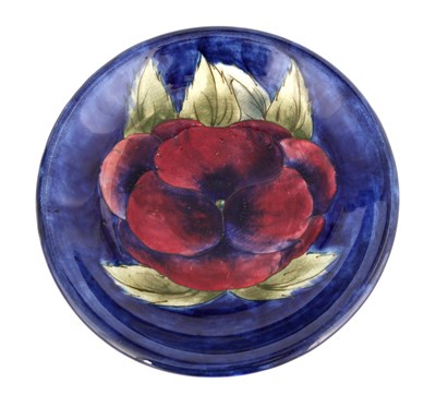 Lot 27 - A WILLIAM MOORCROFT BURSLEM SHALLOW DISH...