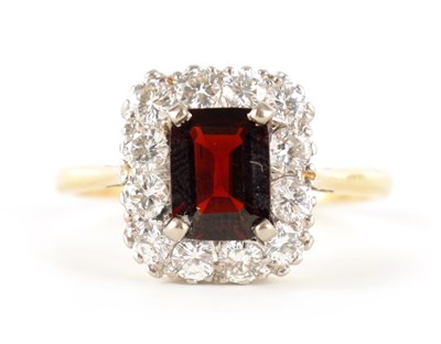 Lot 348 - A LADIES 18CT GOLD AND PLATINUM RUBY AND...