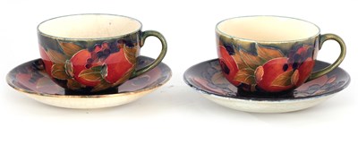 Lot 37 - A PAIR OF EARLY MOORCROFT BURSLEM CABINET CUPS...