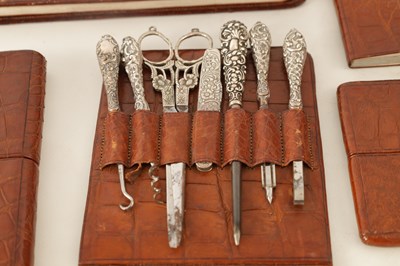 Lot 387 - A FINE VICTORIAN CROCODILE SKIN LADIES...
