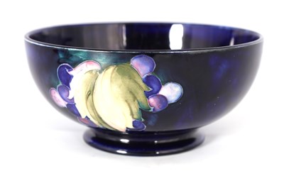 Lot 43 - A 1930S MOORCROFT FOOTED BOWL decorated in the...