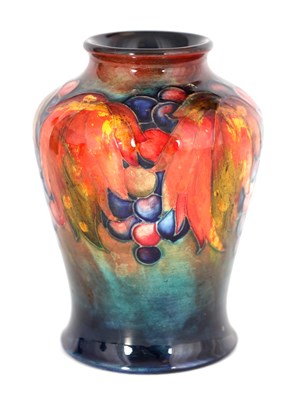Lot 49 - A 1930S MOORCROFT TAPERING SHOULDERED VASE...