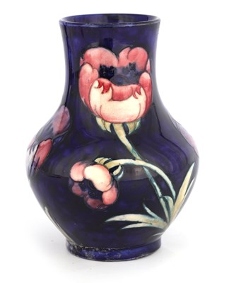 Lot 51 - A MOORCROFT BULBOUS VASE WITH SLENDER NECK...
