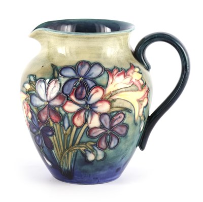 Lot 55 - A MOORCROFT SHOULDERED TAPERING JUG tube lined...