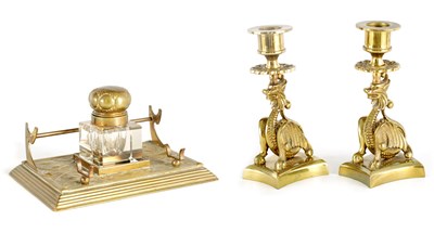 Lot 586 - A PAIR OF ORIENTAL STYLE BRASS CANDLESTICKS...