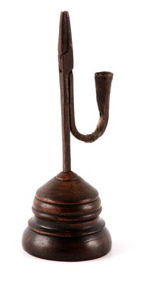 Lot 611 - AN 18TH CENTURY STYLE RUSH LIGHT having a...
