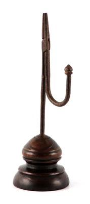 Lot 612 - AN 18TH/19TH CENTURY RUSH LIGHT having a...
