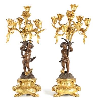 Lot 616 - A PAIR OF 19TH CENTURY BRONZE AND ORMOLU SEVEN...