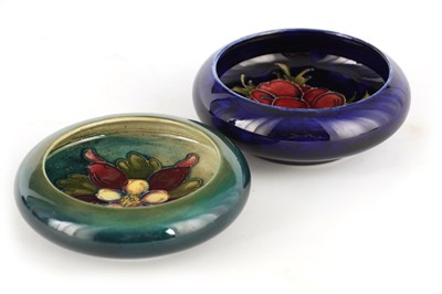 Lot 65 - TWO MOORCROFT SHALLOW SMALL DISHES WITH CURVED...