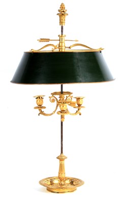 Lot 658 - A REGENCY ADJUSTABLE ORMOLU THREE BRANCH...
