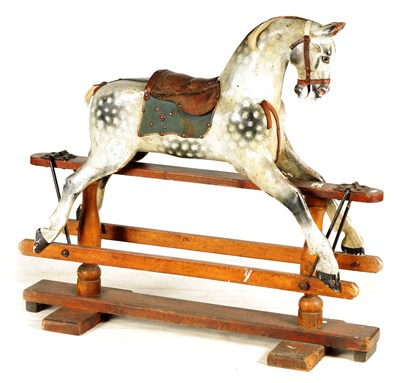 Lot 684 - A 19TH CENTURY CARVED WOOD DAPPLED GREY...