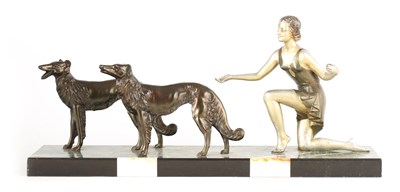 Lot 696 - AN ART DECO BRONZED METAL FIGURE GROUP...