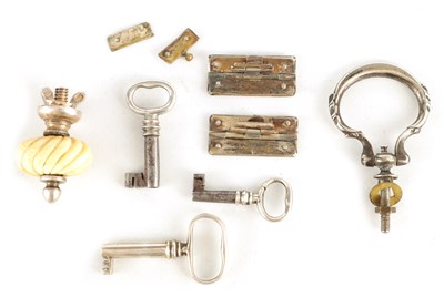 Lot 698 - A SELECTION OF SILVER KEYS, FINIALS AND HINGES...