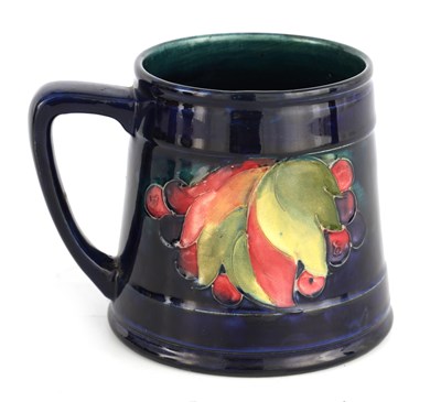 Lot 98 - A 1930S/40S MOORCROFT TAPERING MUG tube lined...