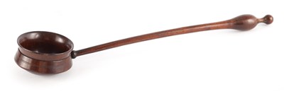 Lot 983 - AN 18TH CENTURY TURNED WALNUT TREENWARE LADLE...