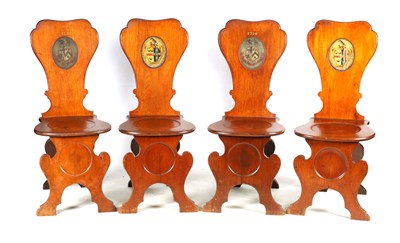 Lot 1018 - A SET OF FOUR MID GEORGIAN FIGURED MAHOGANY SGABELLO HALL CHAIRS