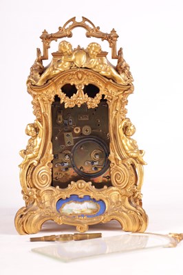 Lot 778 - DROCOURT (CIRCA 1860)  A FINE AND RARE MID 19TH CENTURY FRENCH GILT BRASS AND SEVRES STYLE PORCELAIN PANELLED ROCOCO REPEATING CARRIAGE CLOCK