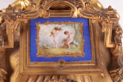 Lot 778 - DROCOURT (CIRCA 1860)  A FINE AND RARE MID 19TH CENTURY FRENCH GILT BRASS AND SEVRES STYLE PORCELAIN PANELLED ROCOCO REPEATING CARRIAGE CLOCK