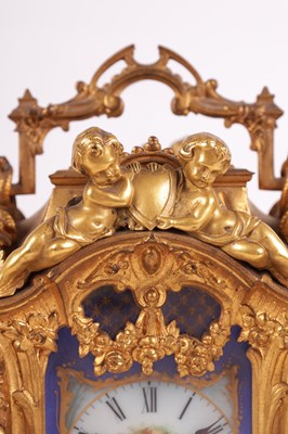 Lot 778 - DROCOURT (CIRCA 1860)  A FINE AND RARE MID 19TH CENTURY FRENCH GILT BRASS AND SEVRES STYLE PORCELAIN PANELLED ROCOCO REPEATING CARRIAGE CLOCK