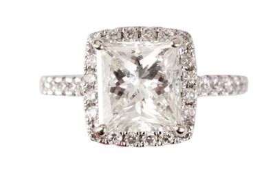 Lot 208 - A FINE PRINCESS CUT 3.04 CT DIAMOND SOLITAIRE...