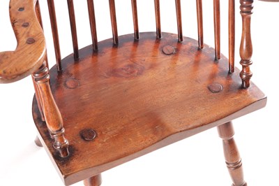 Lot 1019 - AN 18TH CENTURY ASH AND ELM COMB BACK WINDSOR CHAIR