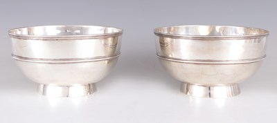 Lot 59 - A LARGE PAIR OF LATE 19TH CENTURY CHINESE SILVER BOWLS OF MILITARY INTEREST