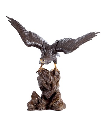 Lot 130 - AN IMPRESSIVE MEIJI PERIOD JAPANESE PATINATED BRONZE AND GILT HIGHLIGHTED SCULPTURE OF AN EAGLE