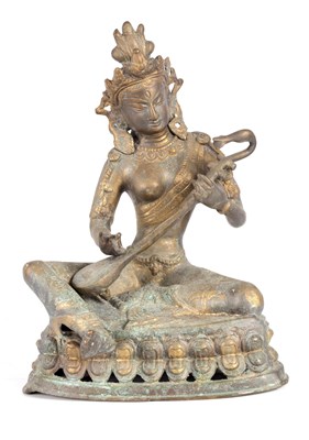 Lot 151 - A GILT BRONZE TIBETAN SEATED BUDDHA