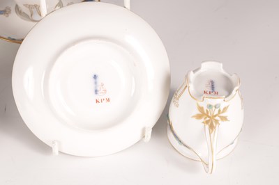 Lot 51 - A SET OF TEN ART NOUVEAU KPM PORCELAIN COFFEE CUPS AND SAUCERS
