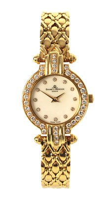 Lot 260 - AN 18CT GOLD LADIES WRIST WATCH BY BAUME & MERCIER