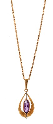 Lot 243 - A LADIES 9CT GOLD AND AMETHYST PENDANT ON 9CT GOLD CHAIN